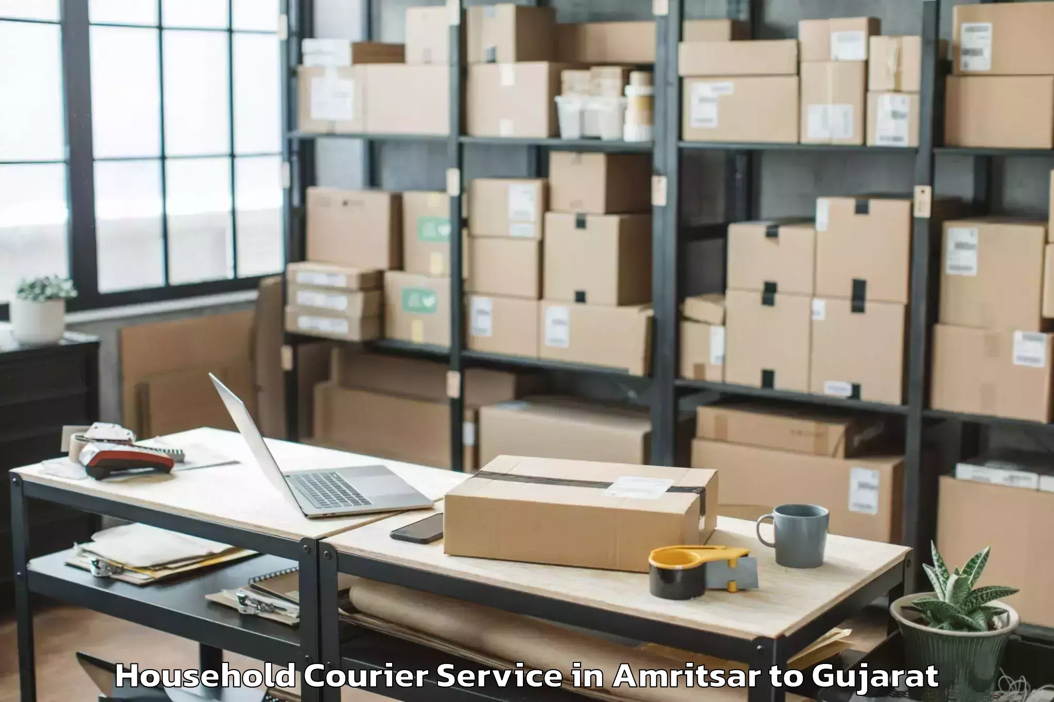 Efficient Amritsar to Lunavada Household Courier